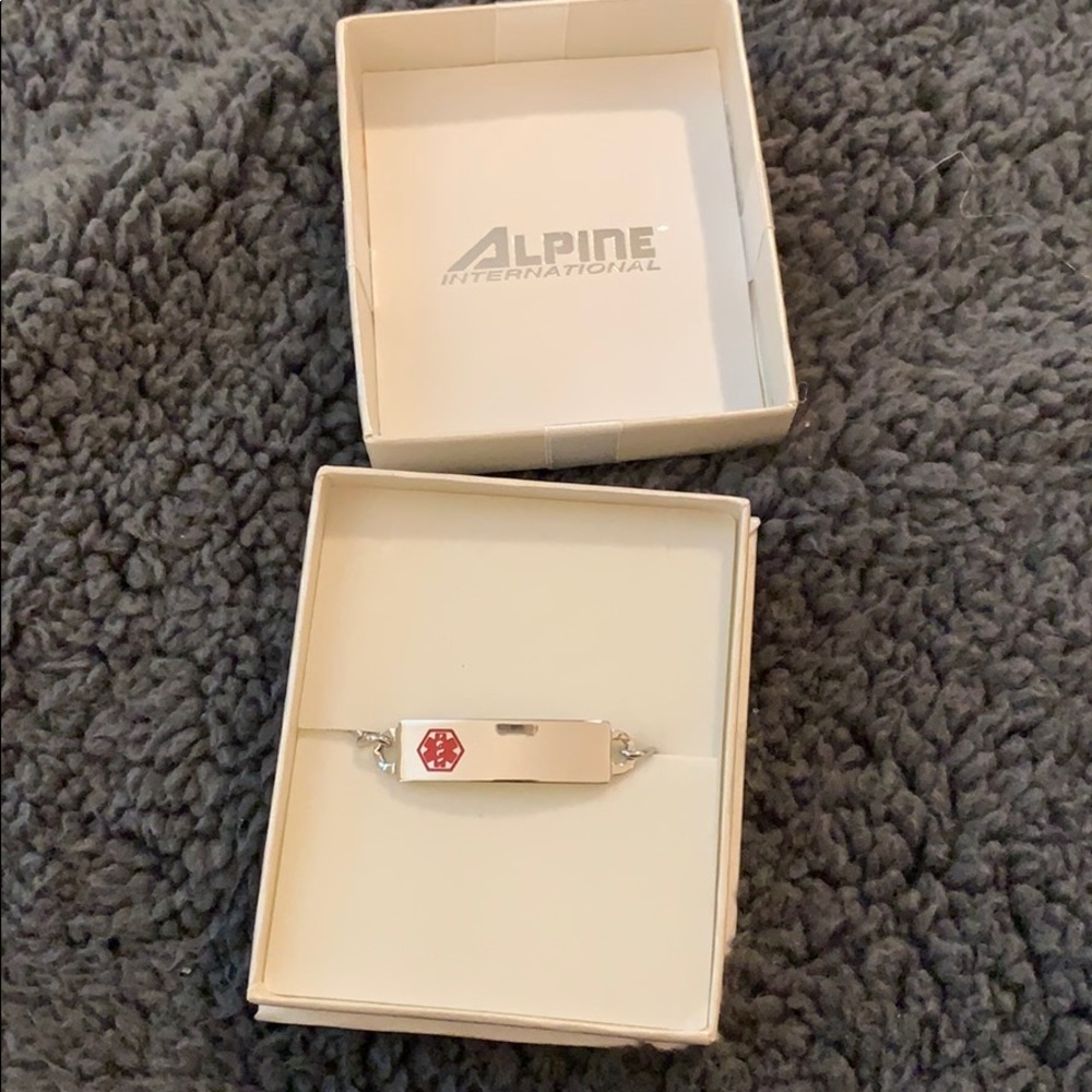 Child’s medic alert bracelet.